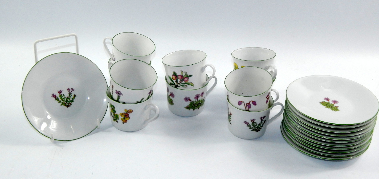 Appraisal: A set of Porsgrund porcelain coffee cups and saucers decorated