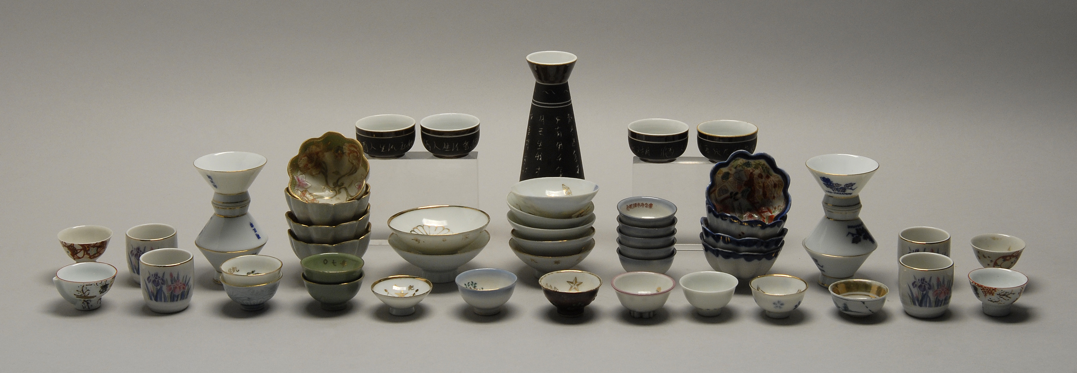 Appraisal: LARGE COLLECTION OF ASSORTED PORCELAIN SAKE CUPS Together with sake