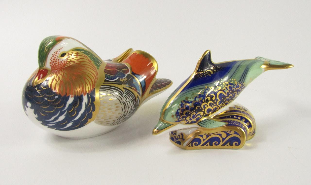 Appraisal: A Royal Crown Derby Imari paperweight modelled as a Mandarin