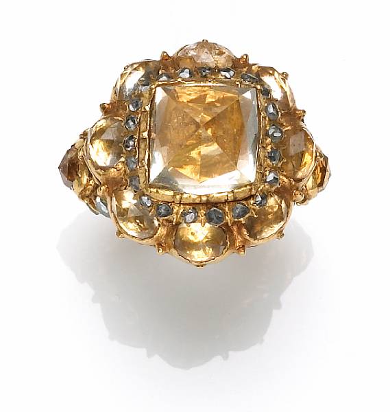 Appraisal: A yellow stone enamel diamond and k gold ring weighing