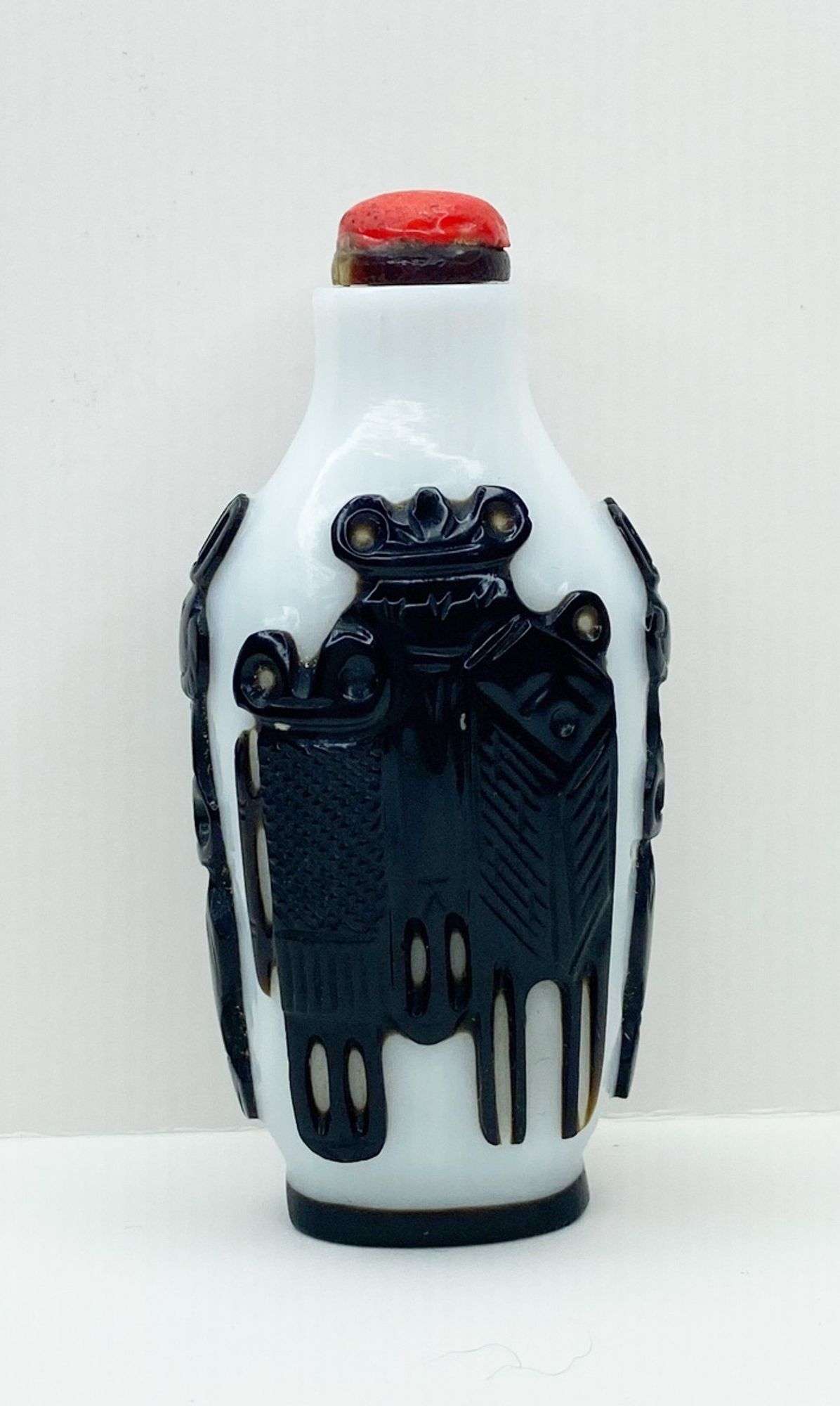 Appraisal: Chinese Carved Peking Glass Snuff Bottle tall at widest Condition