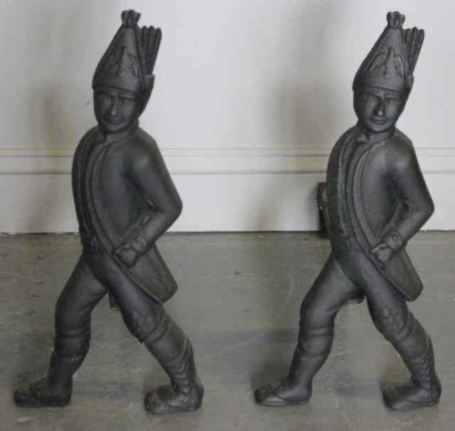 Appraisal: Pair of Cast Iron Hessian Figural Andirons From an Oyster