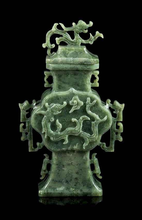 Appraisal: A Spinach Jade 'Chilong' Covered Vase Height inches A Spinach