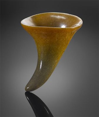 Appraisal: A Chinese rhinoceros horn libation cup plainly carved and grading