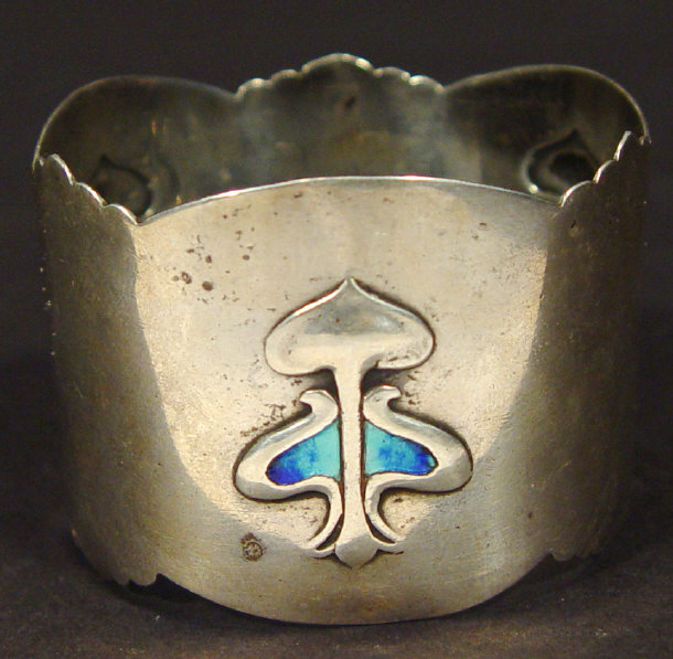 Appraisal: Art Nouveau silver napkin ring with embossed and blue enamelled