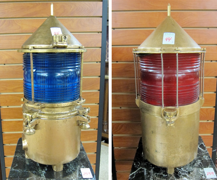 Appraisal: TWO NAUTICAL CHANNEL MARKER LIGHTS similar cylindrical cast brass cases