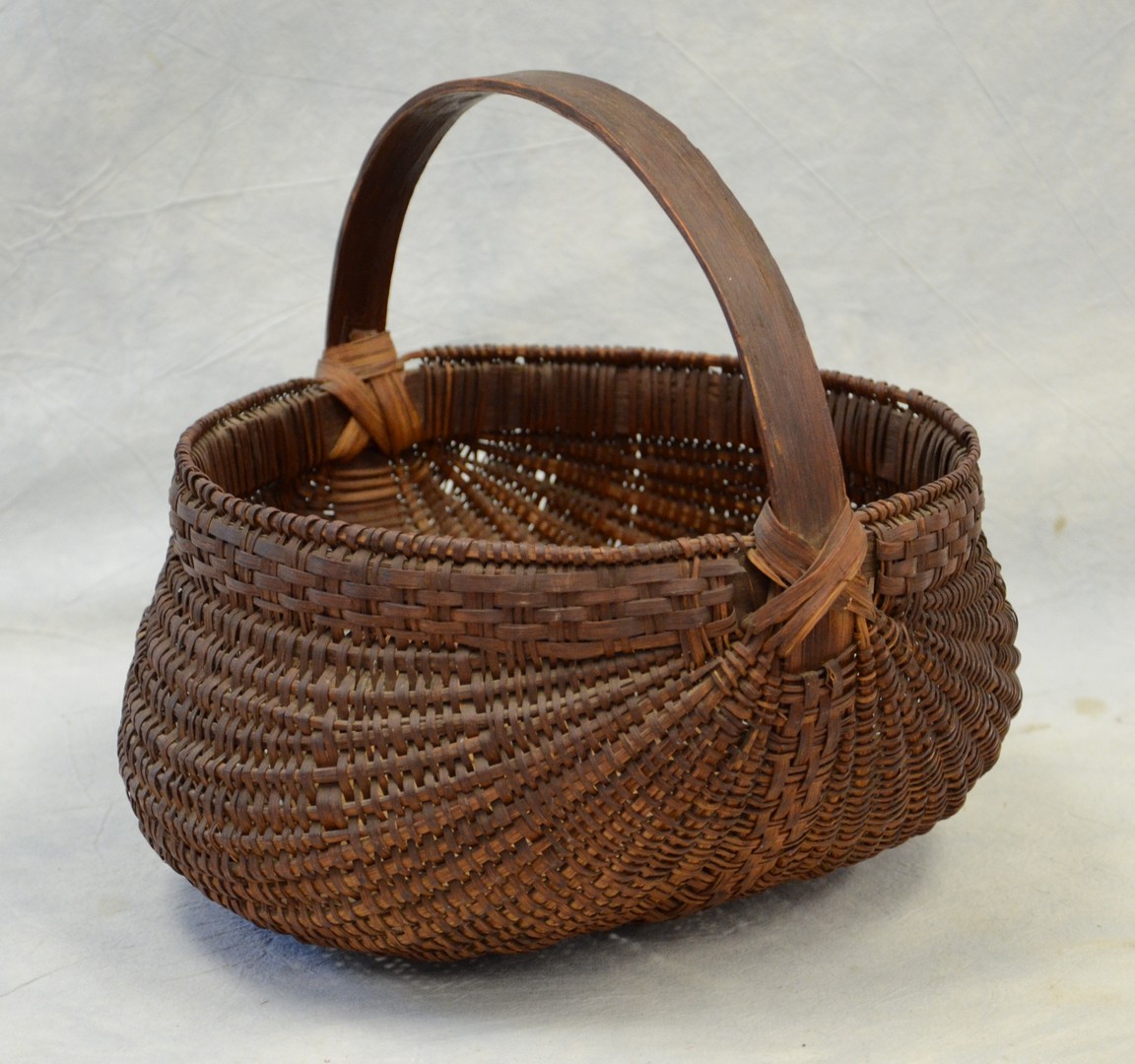 Appraisal: Oak splint basket flat butt form wonderful nutty patina Kentucky