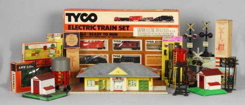 Appraisal: Large Lot of Post-War Train Cars Accessories Description Includes Tyco