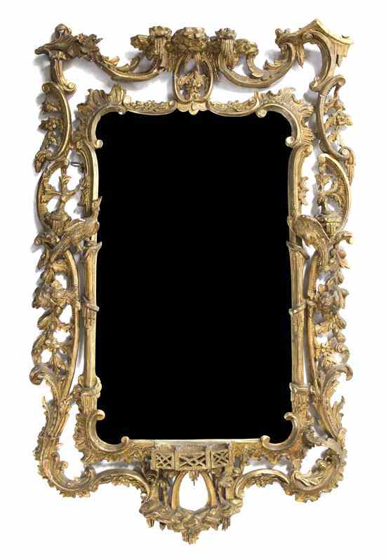 Appraisal: A Chippendale Style Giltwood Mirror having a shaped rectangular plate