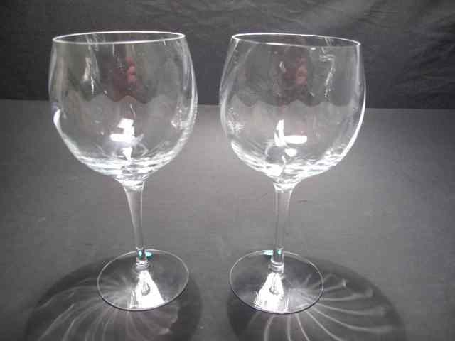 Appraisal: Pair of Tiffany crystal wine glasses Swirled design on glass