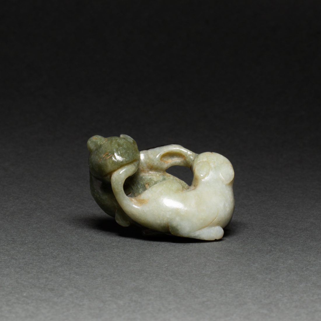 Appraisal: CHINESE CELADON JADE TOGGLE Chinese celadon jade toggle carved in