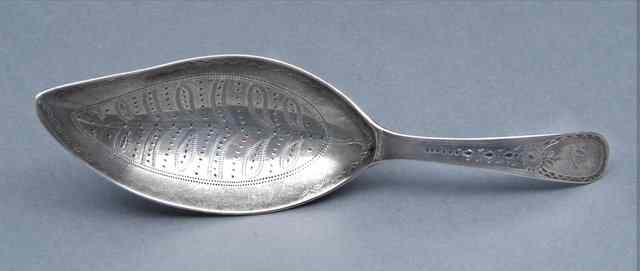 Appraisal: A GEORGE III SILVER CADDY SPOON with a leaf shaped