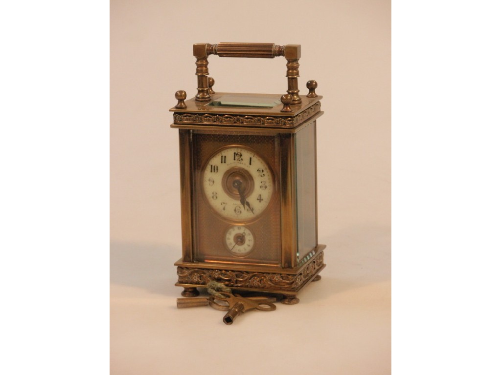 Appraisal: An early thC brass cased carriage clock the cream dial