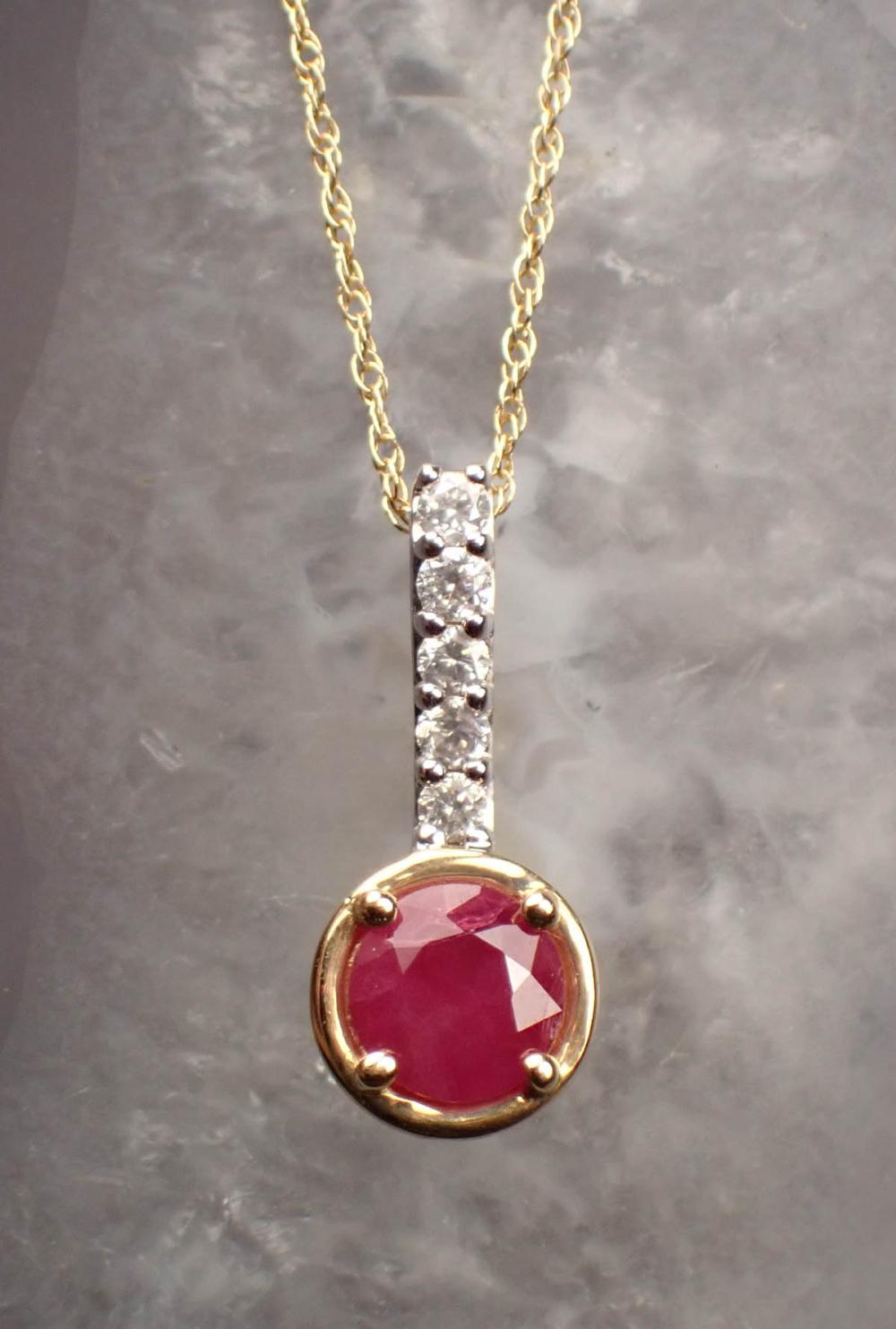 Appraisal: RUBY DIAMOND AND FOURTEEN KARAT GOLD PENDANT NECKLACE with an