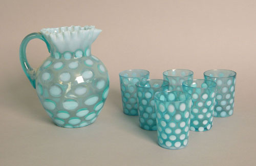 Appraisal: Seven piece blue and opalescent glass lemonade set pitcher is