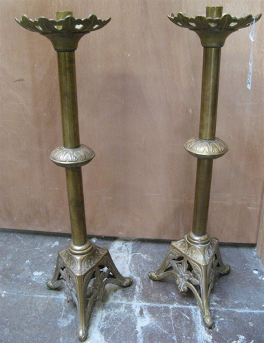 Appraisal: PAIR CONTINENTAL BRASS BANQUET CANDLEHOLDERS having a large pierced drip