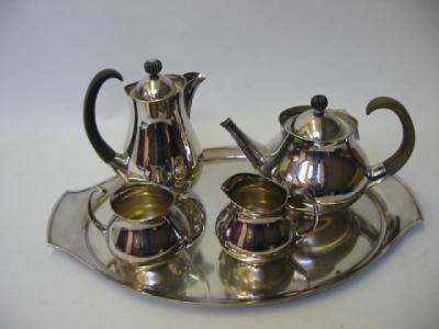 Appraisal: A FIVE PIECE TEA SET designed by Eric Clements for