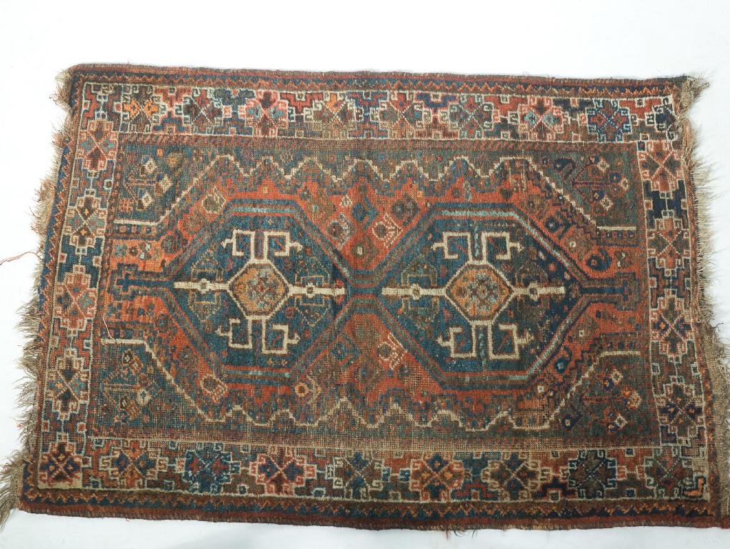 Appraisal: SHIRAZ RUG EARLY th CENTURY the two blue medallions against