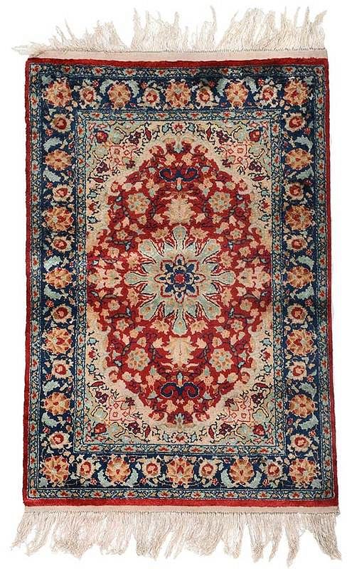 Appraisal: Silk Qum Rug central medallion of green red field with