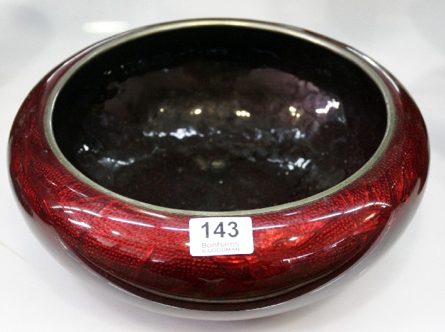 Appraisal: A Japanese cloisonn bowl in rich ruby tones and featuring