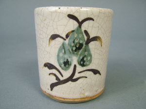 Appraisal: A Bernard Leach stoneware cylindrical vase with inverted rim covered