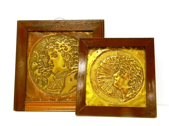 Appraisal: Pair of repousse brass wall hangings Arts Crafts style square