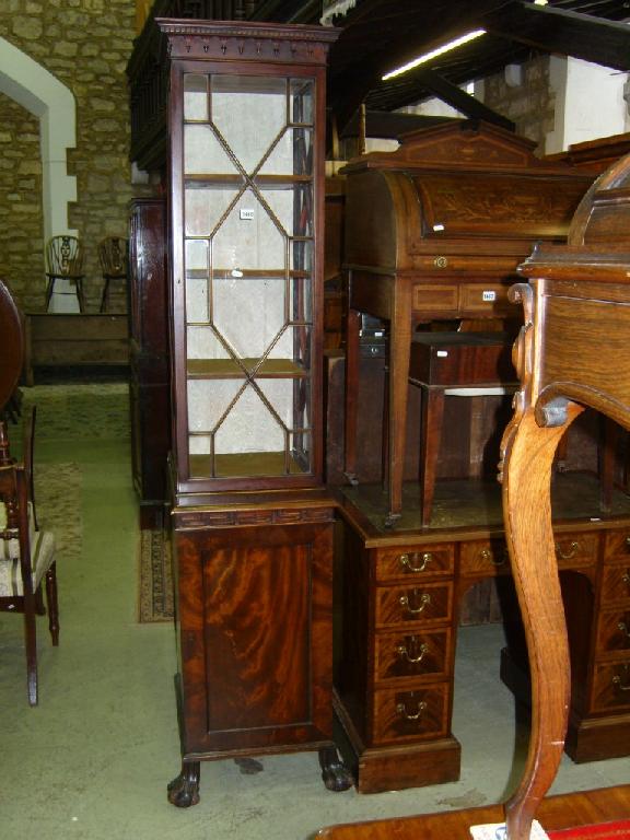 Appraisal: An Edwardian mahogany display cabinet of square cut form in