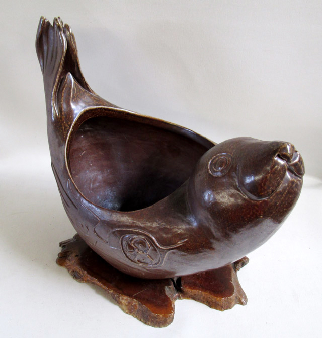 Appraisal: EARTHENWARE SCULPTURAL SEAL BOWL BY MICHAEL FROMME having a dark