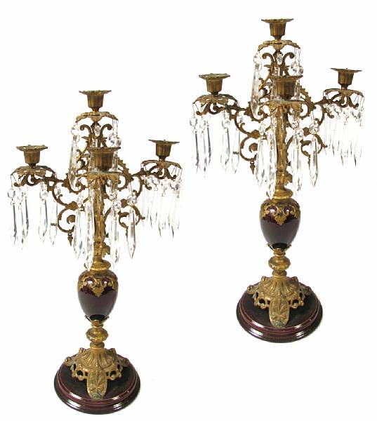 Appraisal: A pair of Rococo style five light candelabra losses height