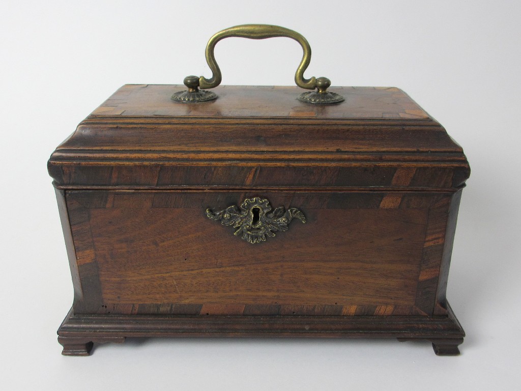 Appraisal: A George III walnut and crossbanded rectangular tea caddy with