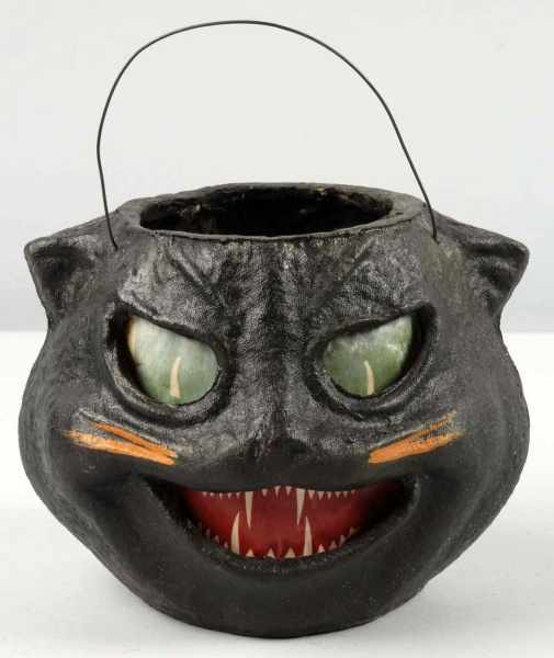 Appraisal: American Pulp Black Cat Jack-O-Lantern Description Original paper labels and