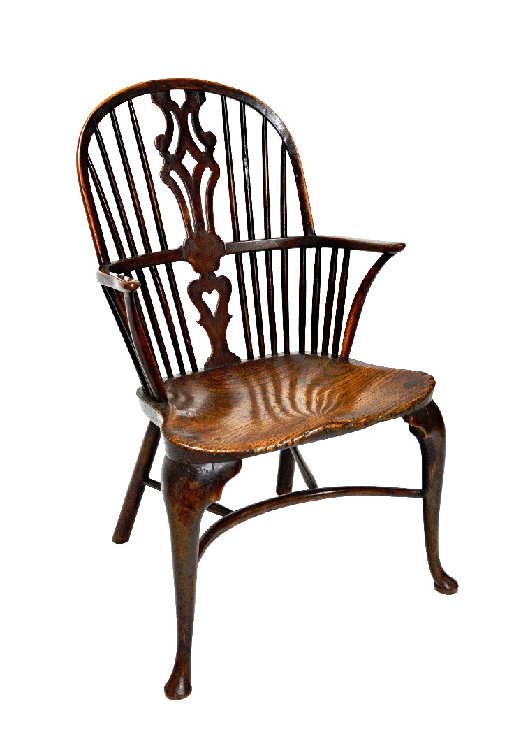 Appraisal: A George III ash and elm hoop back Windsor chair