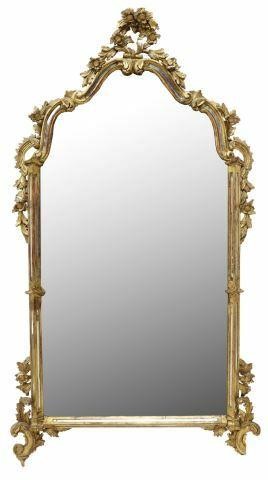 Appraisal: Florentine giltwood wall mirror th c the center flat silvered