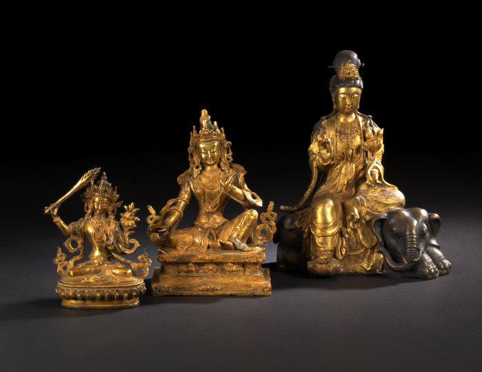 Appraisal: Chinese Partially Gilt Figure of Guan Yin depicted seated on