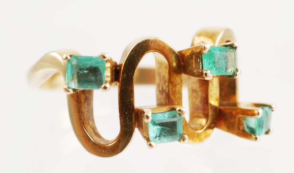 Appraisal: Modern design k gold ring with four emeralds Weighs grams