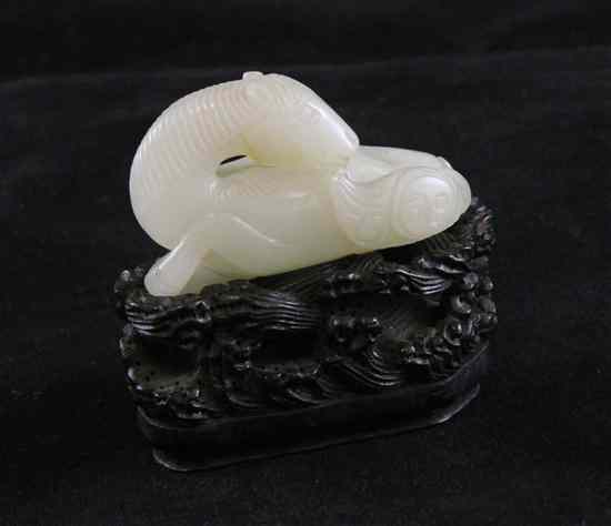 Appraisal: A Chinese pale celadon jade figure of a recumbent horse