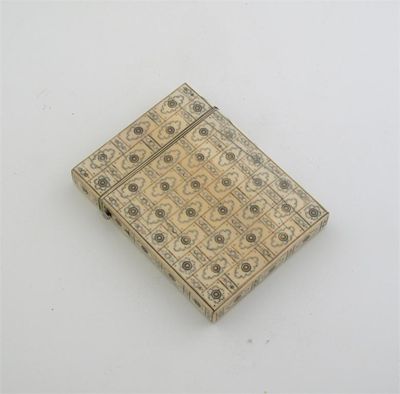 Appraisal: A Victorian ivory card case with a repeating pique design