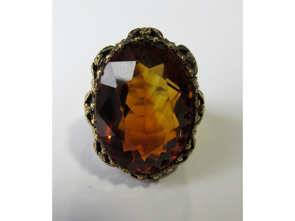 Appraisal: A gold citrine set dress ring with oval citrine x