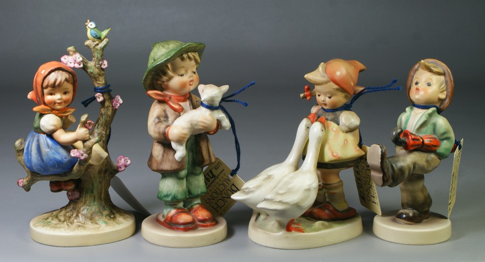 Appraisal: Hummel figurines Goose Girl Hum some crazing Happy Traveler Hum