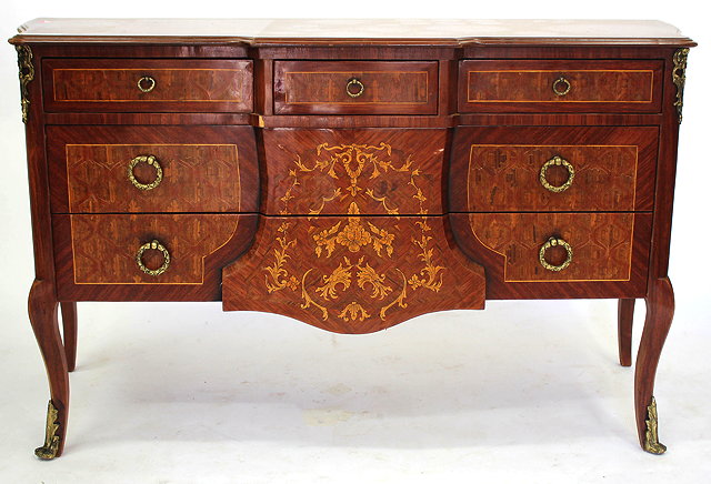 Appraisal: A LOUIS XV STYLE SIDEBOARD with shaped top and outset