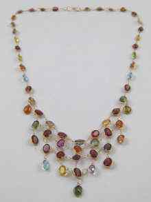 Appraisal: A yellow metal tests ct gold multi gem set necklace