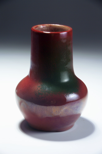 Appraisal: DEDHAM Experimental bulbous vase by Hugh Robertson covered in oxblood