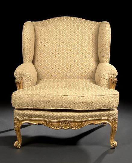 Appraisal: Louis XV-Style Giltwood Bergere avec Orielles ca the domed and