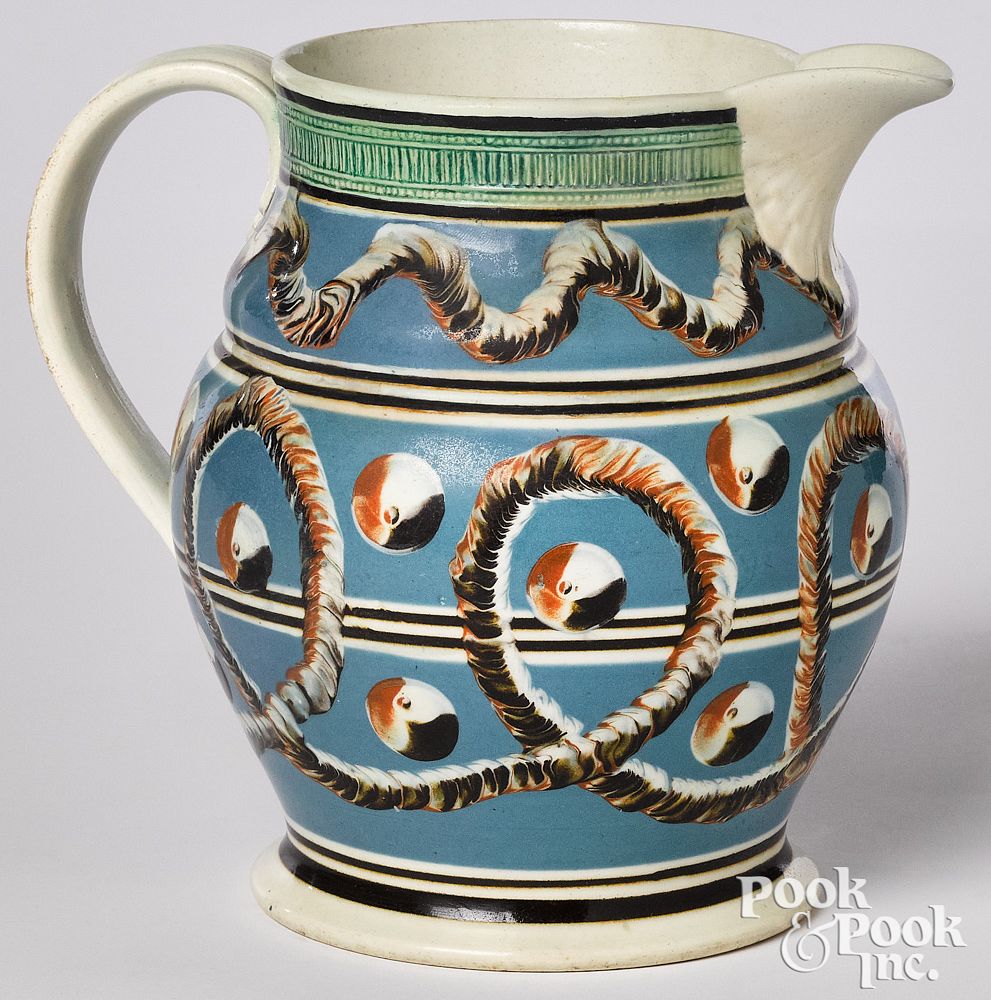 Appraisal: Mocha pitcher Mocha pitcher with earthworm and cats-eye decoration h