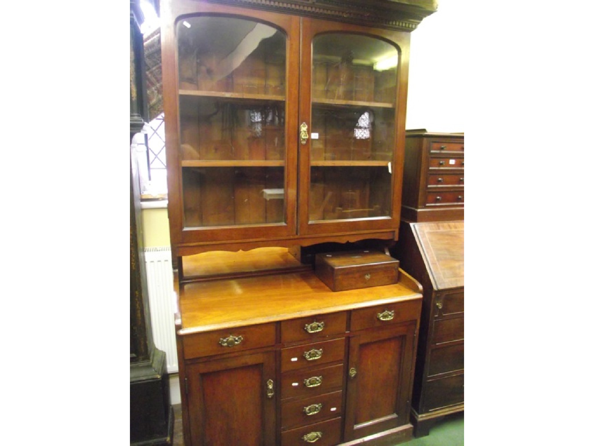 Appraisal: A Victorian mahogany library bookcase the lower section enclosed by