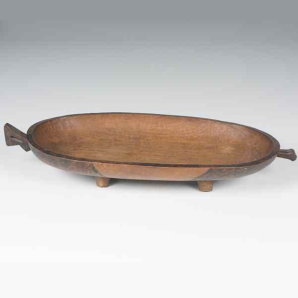 Appraisal: Zulu Wooden Bowl oval bowl with four legs and two