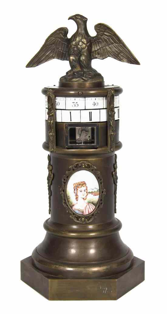 Appraisal: A Continental Cast Metal and Porcelain Inset Annular Clock having