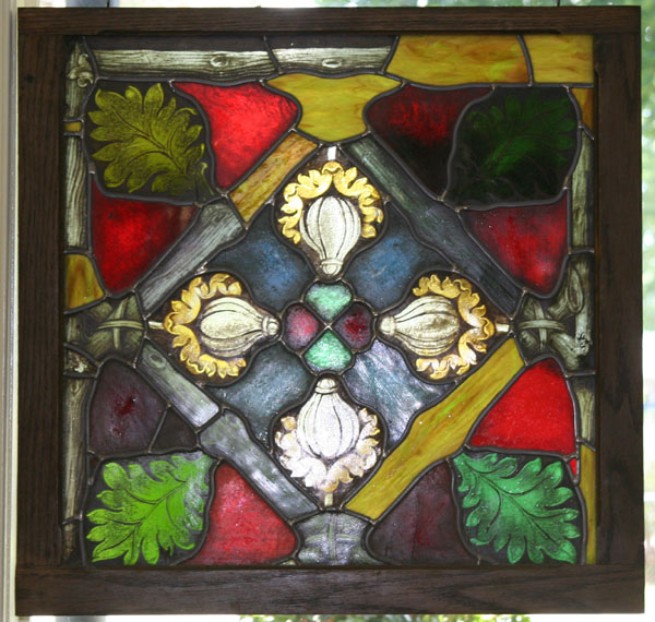 Appraisal: Framed leaded stained glass pub window geometric pattern comprised of