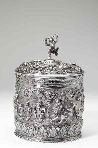 Appraisal: Southeast Asian Silver Repousse Humidorthe cover with dancing figural finial