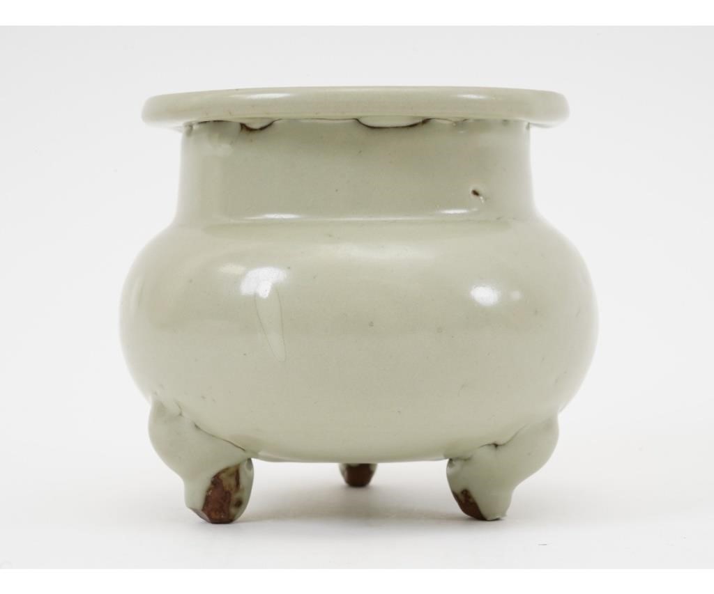 Appraisal: Rare Chinese Chun ware three footed burner in creamy moonlight